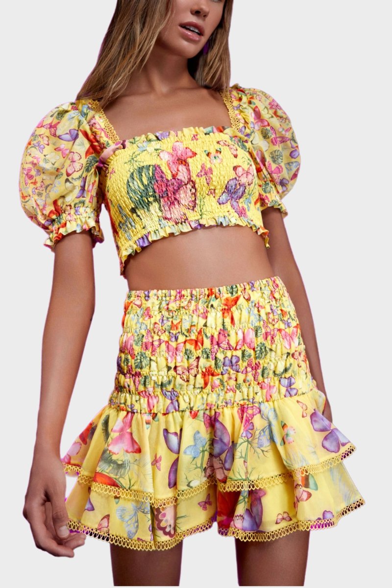 Yellow - Women's white cropped blouse featuring a colourful butterfly and botanical print, a shirred bodice, square neckline, and short puff sleeves, paired with a matching tiered mini skirt.