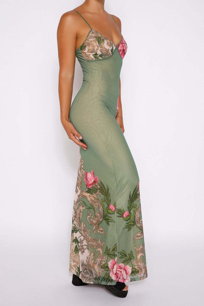 Olive - Women's form-fitting green slip maxi dress featuring a large pink floral and ornate botanical print, styled with delicate spaghetti straps.