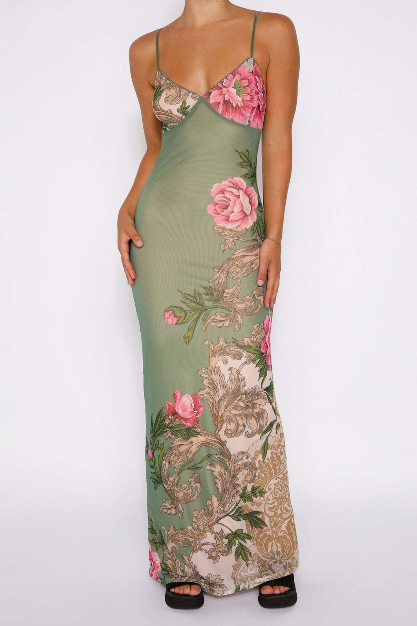 Olive - Women's form-fitting green slip maxi dress featuring a large pink floral and ornate botanical print, styled with delicate spaghetti straps.