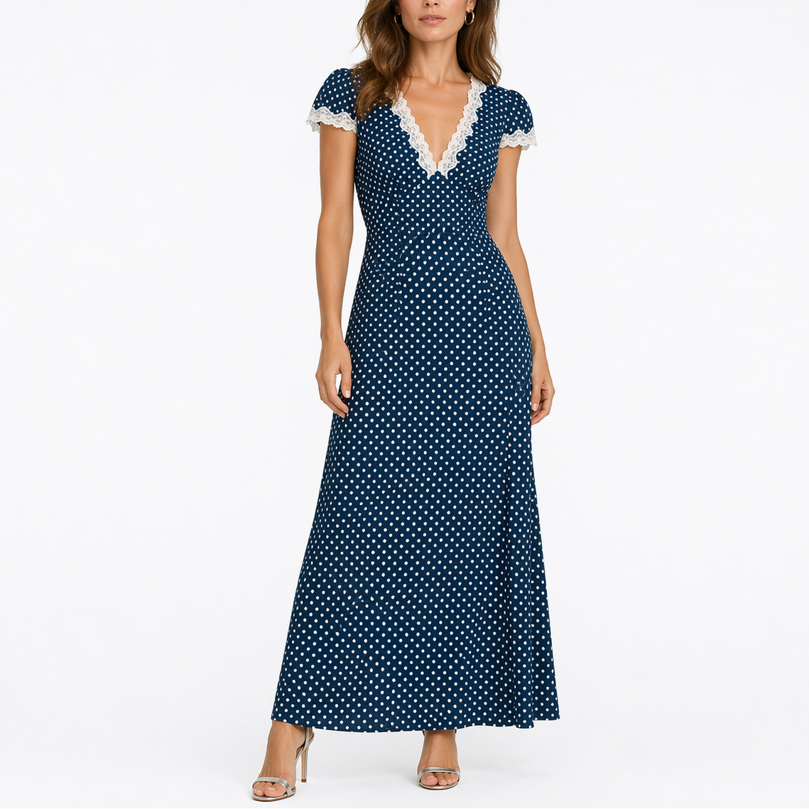 Blue - Woman wearing a long polka-dot maxi dress with lace-trimmed short sleeves and a V-neckline