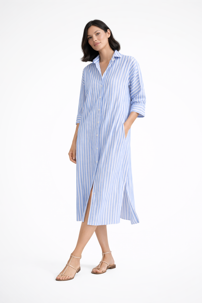 Blue - Woman wearing a striped poplin midi shirt dress with 3/4 sleeves, collar, and side splits on a white background