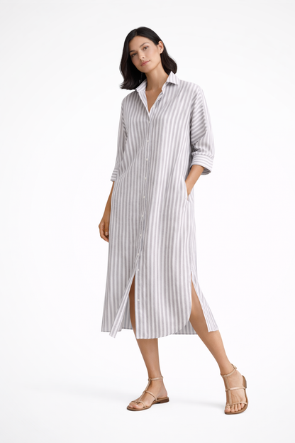 Grey - Woman wearing a striped poplin midi shirt dress with 3/4 sleeves, collar, and side splits on a white background