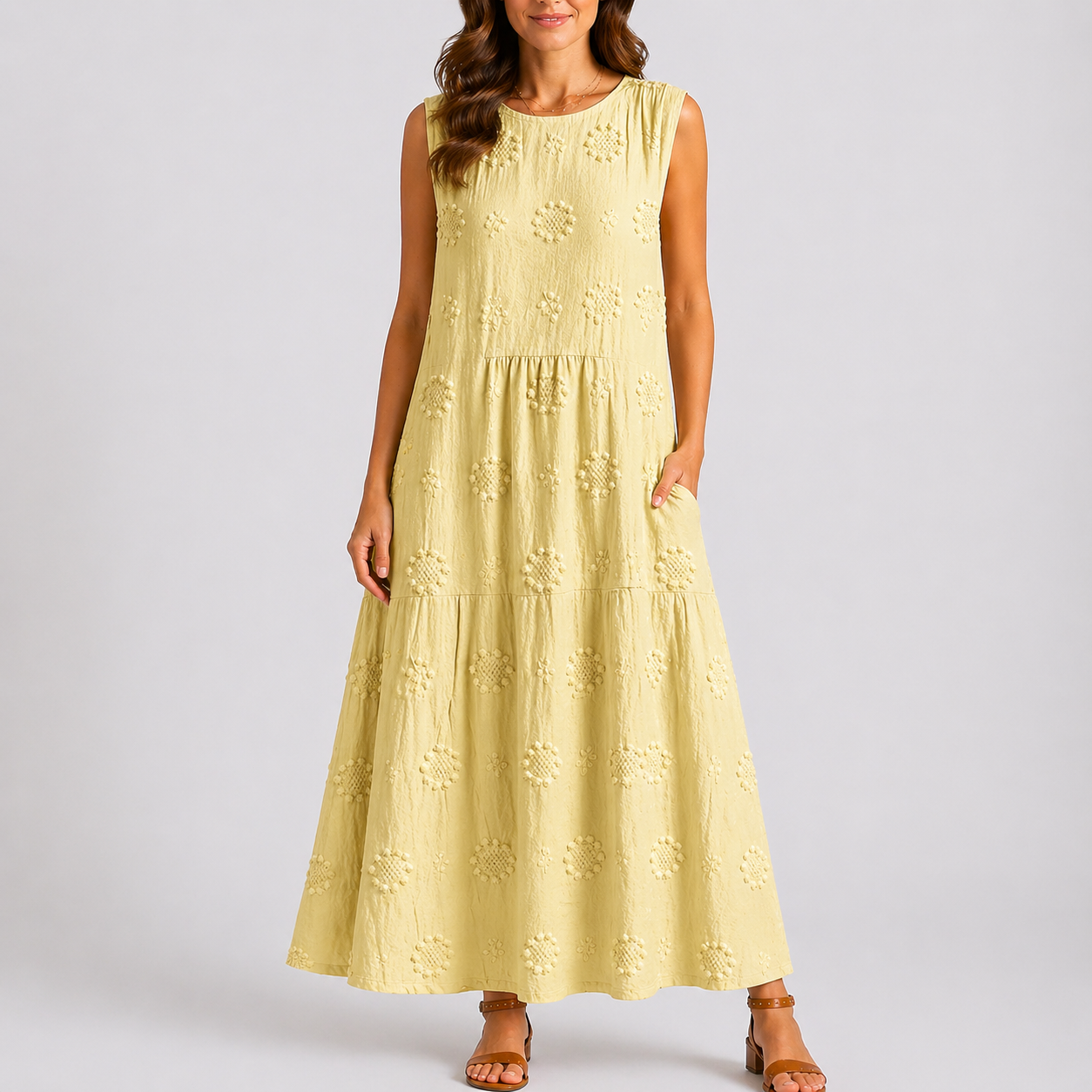 Light yellow - Sleeveless midaxi smock dress featuring tufted floral patterns, a round neckline, and side pockets, styled on a model against a plain background.