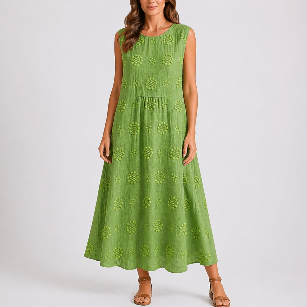 Olive green - Sleeveless midaxi smock dress featuring tufted floral patterns, a round neckline, and side pockets, styled on a model against a plain background.