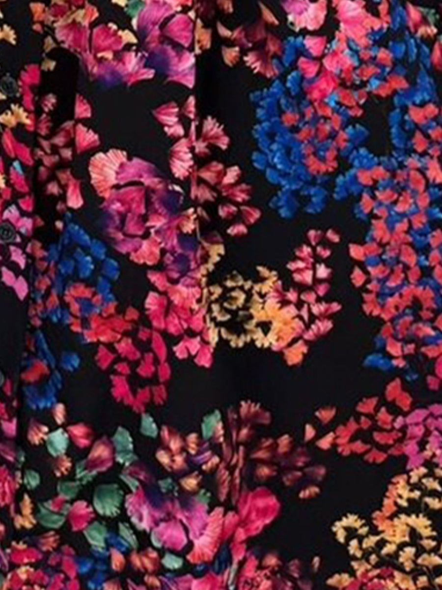 Black - Woman modelling a printed A-line midi dress featuring a sweetheart neckline, button-down bodice, and adjustable tie-straps.