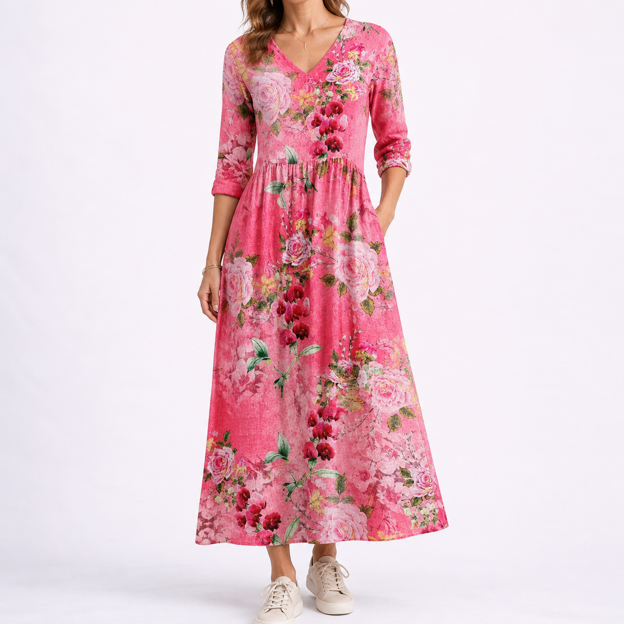 Red - Woman wearing a woven floral midaxi dress with a V-neckline, 3/4-sleeves, and a gathered waist with side pockets, styled with trainers.