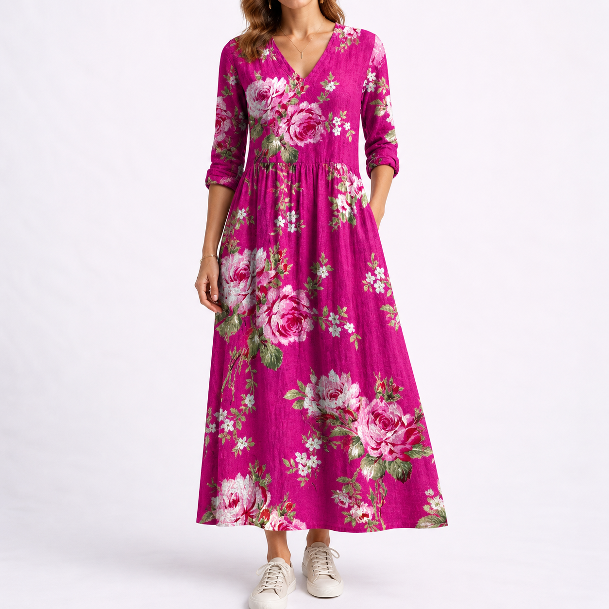 Purple - Woman wearing a woven floral midaxi dress with a V-neckline, 3/4-sleeves, and a gathered waist with side pockets, styled with trainers.