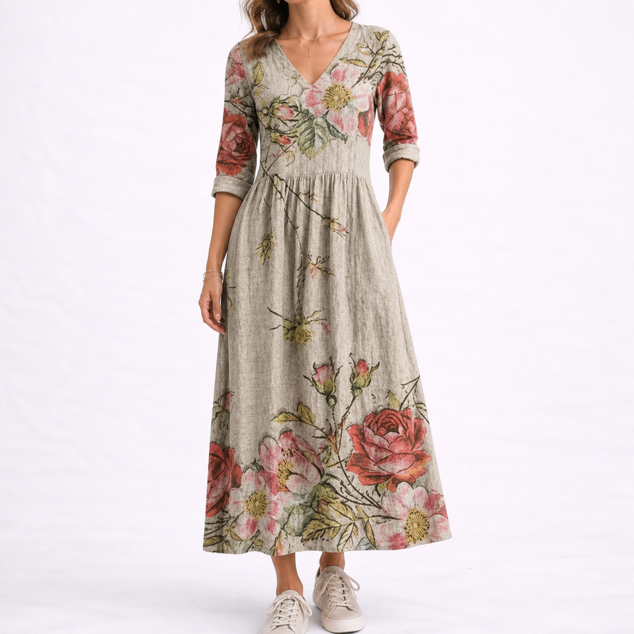 Chalk - Woman wearing a woven floral midaxi dress with a V-neckline, 3/4-sleeves, and a gathered waist with side pockets, styled with trainers.