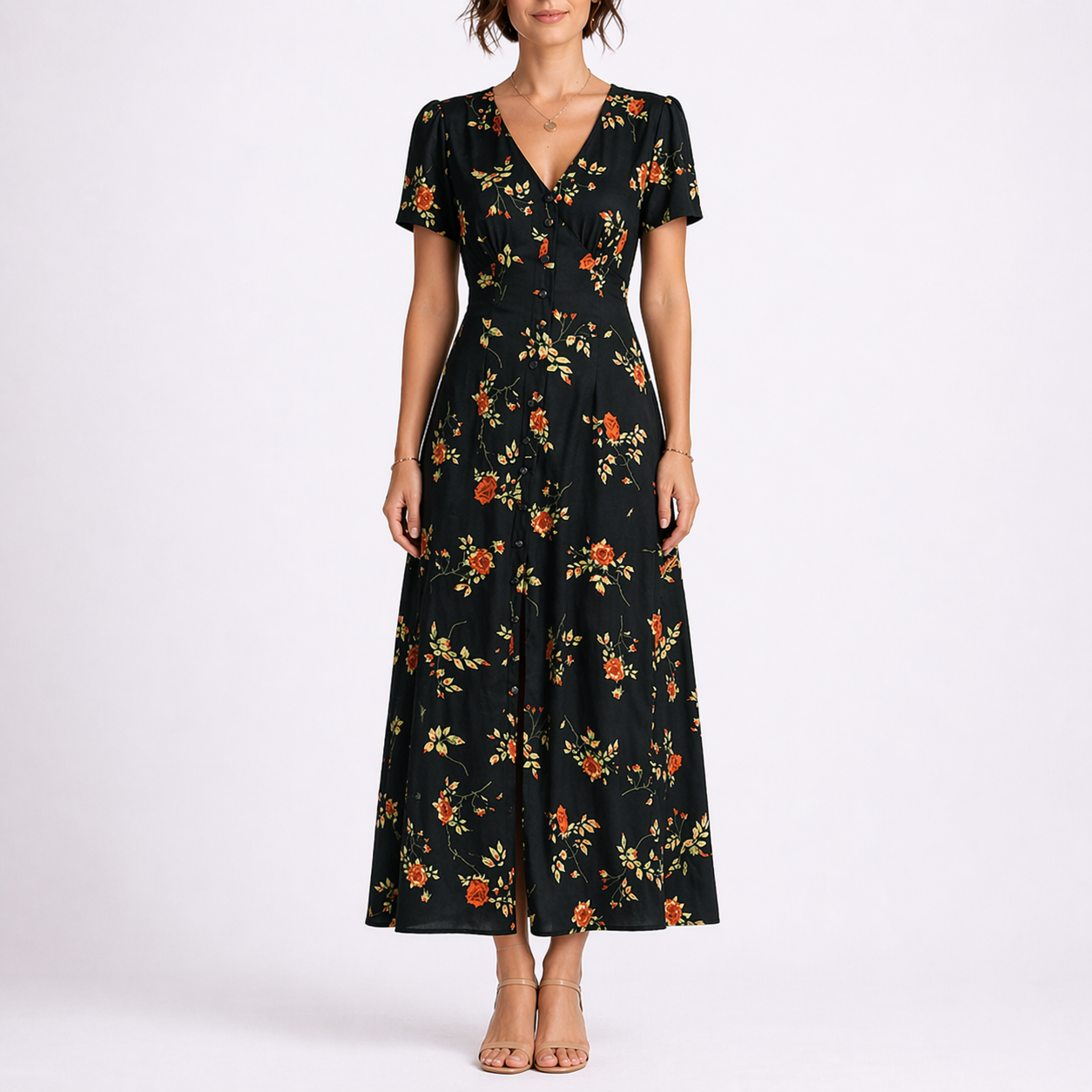 Floral Black - Woman wearing a woven floral short-sleeve maxi dress with a v-neckline and button-down front.