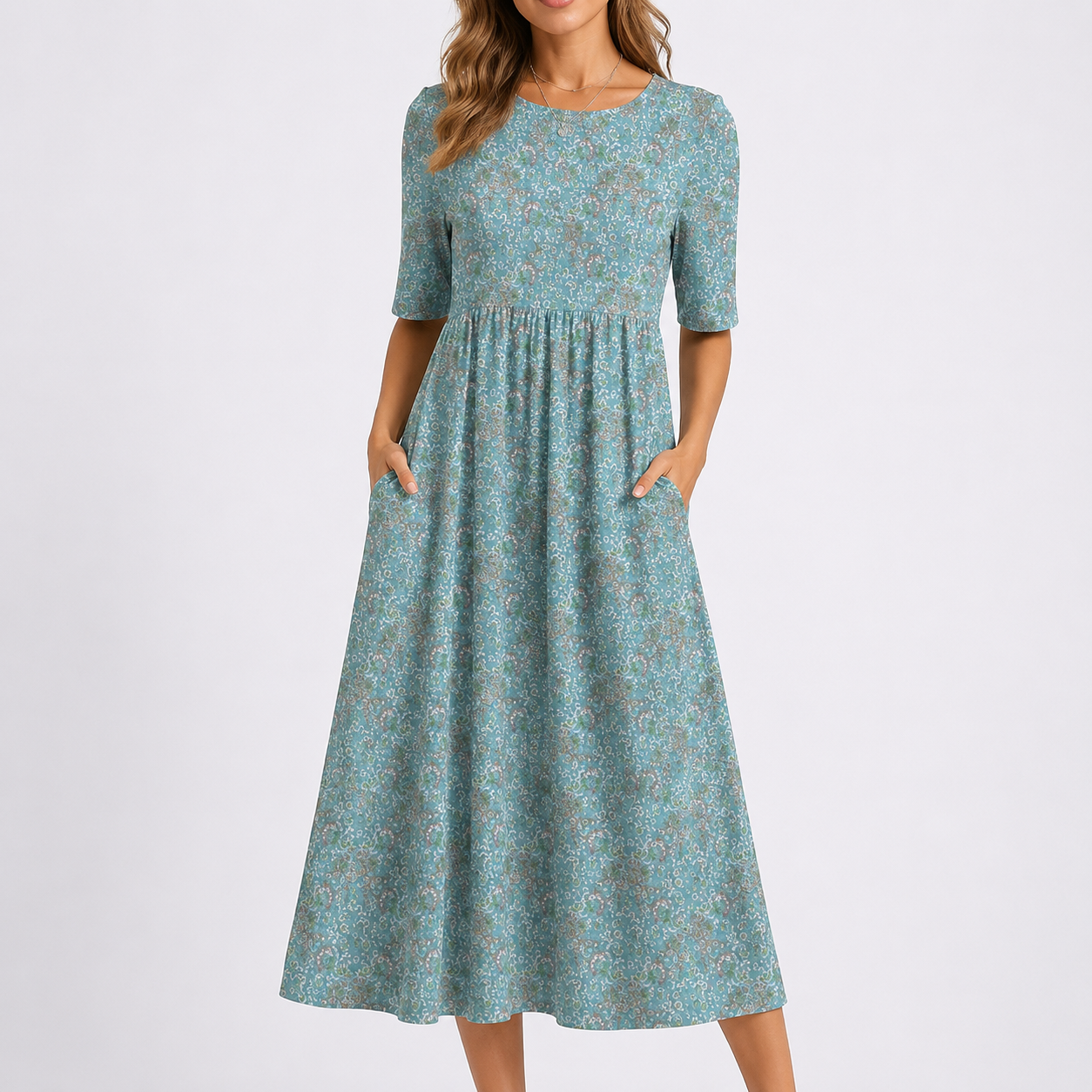 Woman wearing a floral print short-sleeve smock midi dress with a gathered waist and side pockets.
