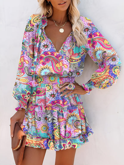 Light Purple - Woman wearing a woven floral V-neck mini dress with long sleeves, smocked waist, and tiered ruffle skirt.