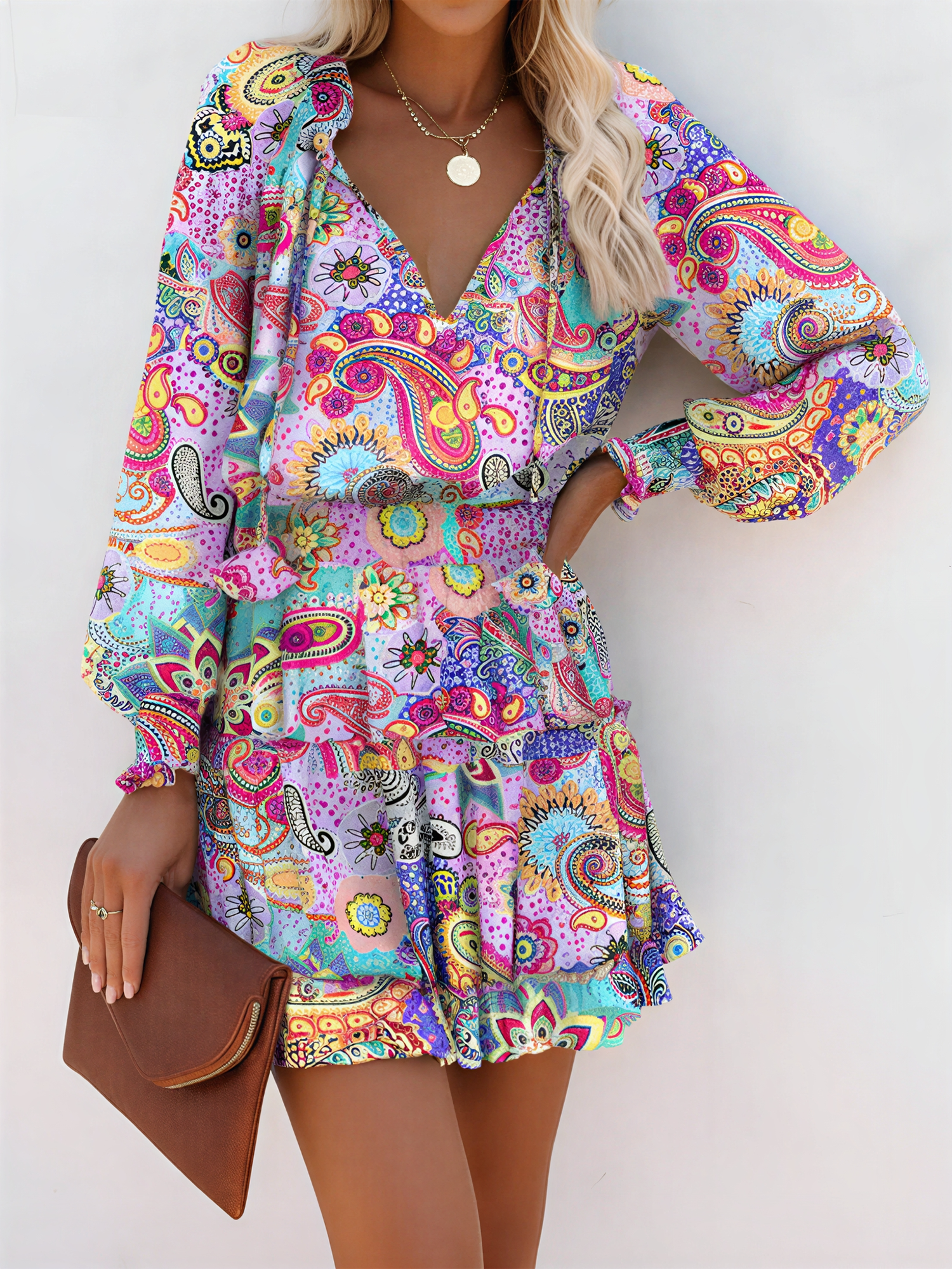 Light Purple - Woman wearing a woven floral V-neck mini dress with long sleeves, smocked waist, and tiered ruffle skirt.