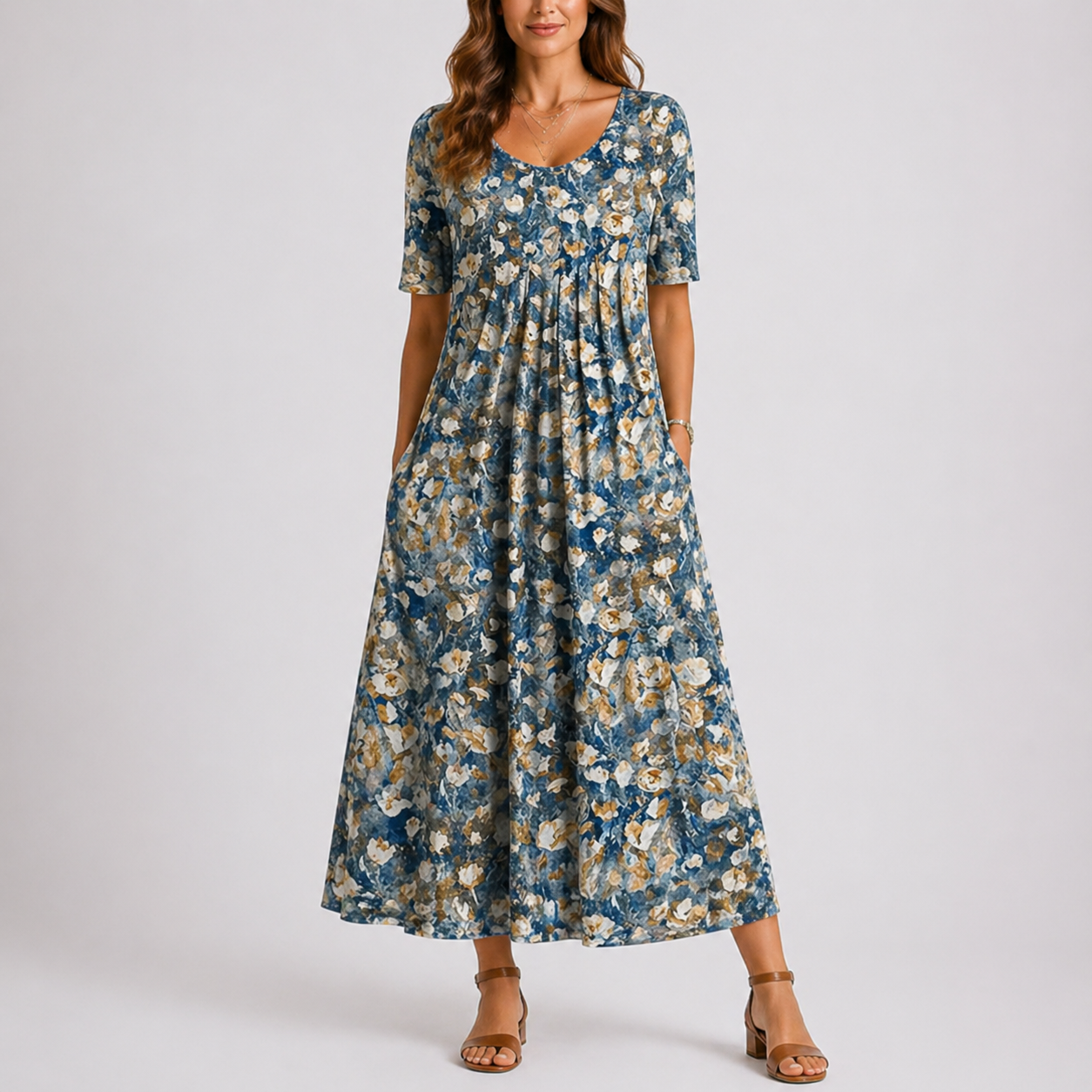 Baby blue - Woman wearing a woven leaf-print short-sleeve smock maxi dress with a scoop neckline and flowing skirt.