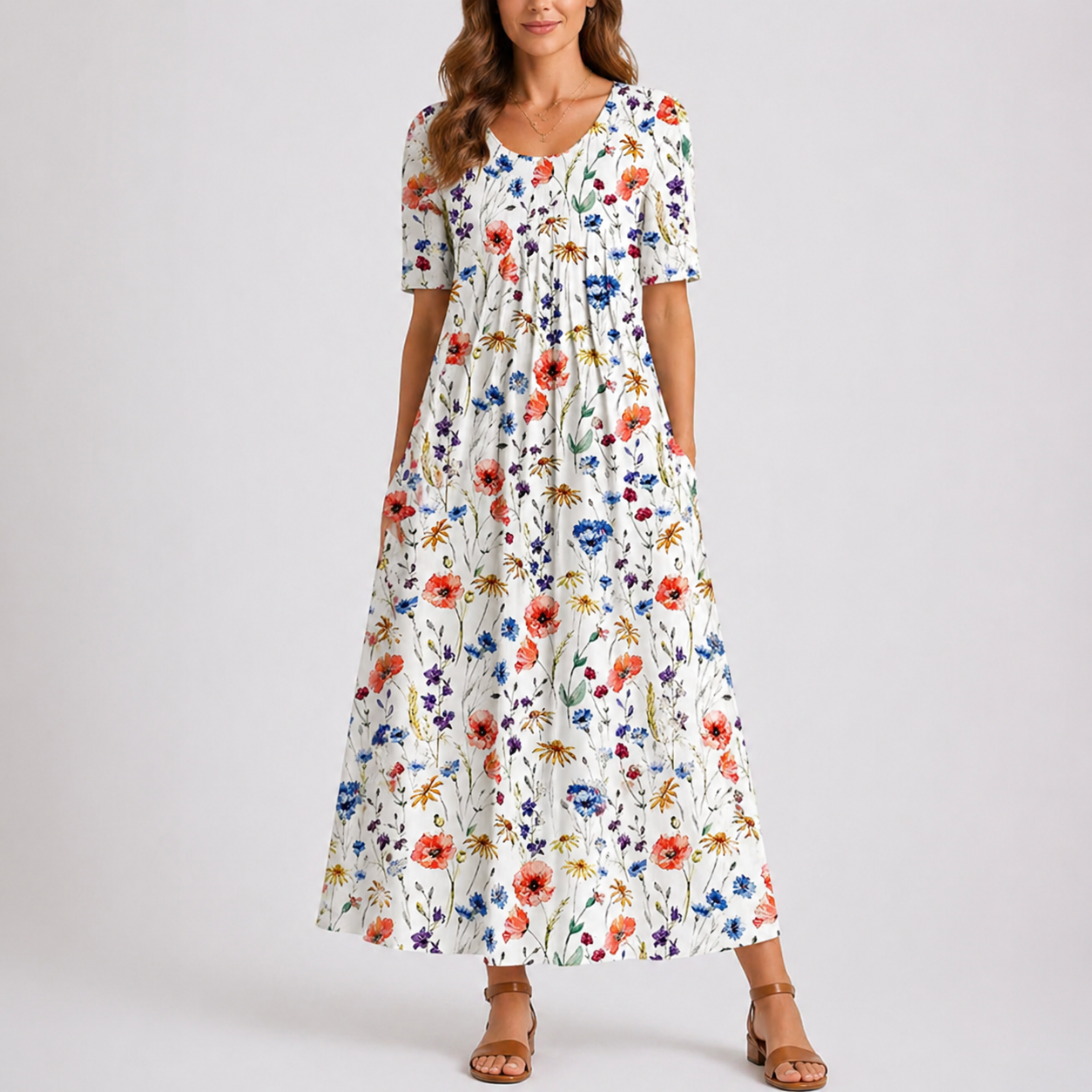 Floral - Woman wearing a woven leaf-print short-sleeve smock maxi dress with a scoop neckline and flowing skirt.