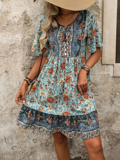 Mixed Colors - Woman wearing a woven paisley print V-neck tiered mini dress with short sleeves and front button detailing.