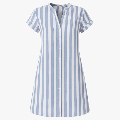 Light Blue - Model on a beach wearing a woven striped short-sleeve shirt dress with a button-front design and relaxed fit